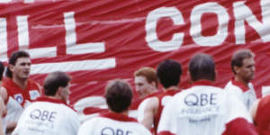 The Swans banner hails the arrival of Barassi in Sydney in 1993.
