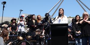 Brittany Higgins speaks at the March 4 Justice protest outside Parliament House in Canberra in 2021.