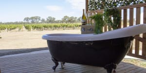 Luxuriate in the outdoor clawfoot bathtub before retiring to the comforts of a luxe safari tent.