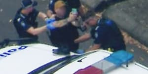 Man appears to take selfie during arrest after highway drama