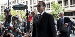George Papadopoulos,former campaign adviser to Donald Trump,arrives for sentencing at federal court in Washington on Friday.