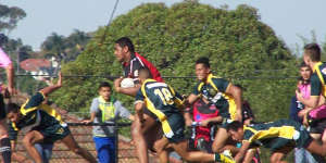 Jordan Mailata with defenders in pursuit while playing under 17s for Bankstown Bulls.