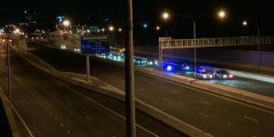 A convoy passes through at the opening to traffic of the M4 East tunnels at 2am on Saturday.