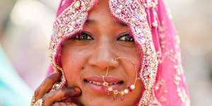 An elegantly decorated and dressed Indian bride.