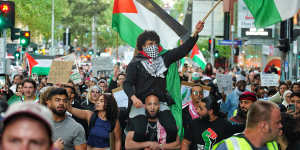 Palestinian supporters gathered outside the State Library in Melbourne for a Freedom For Palestine rally on Tuesday.