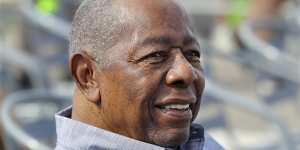 Hank Aaron smiles as he is honoured with a street named after him outside CoolToday Park,the spring training baseball facility of the Atlanta Braves,last year.