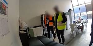 "No one brings their underpants on site and washes them at work.":Union official alleges labourers are living within a major construction site.