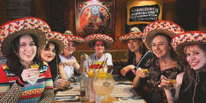Sombreros on,tequila shots aloft,it’s Taco Bill time!