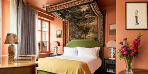The bedrooms feature a tapestry canopy.