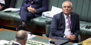 Scott Morrison listens as then-opposition leader Anthony Albanese criticises him in parliament on March 15,2021,over the then-prime minister’s response to the March 4 Justice rally. 