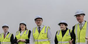 Airport chairman Paul O’Sullivan,Transport Minister Catherine King and Prime Minister Anthony Albanese at Western Sydney International Airport in June.