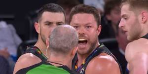 Melbourne United's Chris Goulding clashes with Melbourne Phoenix centre Jordan Hunter