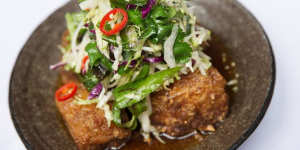 Red Spice Road's signature pork belly dish,with apple slaw,chilli caramel and black vinegar.