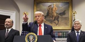 US President Donald Trump speaks alongside Commerce Secretary Howard Lutnick (left) and C.C. Wei,the head of Taiwan Semiconductor Manufacturing Company.