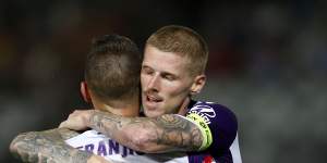 Icing on the cake:Andy Keogh celebrates his late goal with Ivan Franjic.