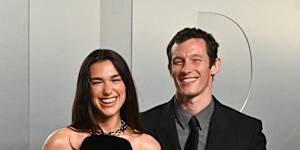 Dua Lipa and Callum Turner arrive at the Vanity Fair Oscar Party.