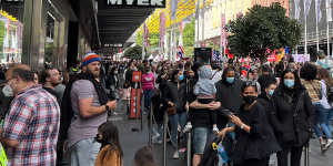 As many young families lined up for a peek at this year’s Myer Christmas windows,protesters provided a sometime unwelcome spectacle as they flowed down Bourke Street Mall.