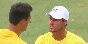 Lleyton Hewitt mentoring Tomic through the 2016 Davis Cup tie against the United States in Melbourne.