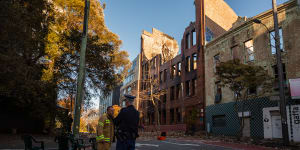 Police and firefighters are still on scene at the wreckage of a large building fire on Randle St,Sydney CBD.