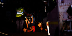 Lidia Thorpe is removed by police after protesting the NSW police float during the Gay and Lesbian Mardi Gras parade.