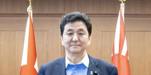 Kishi’s father and former defence minister Nobuo Kishi. 