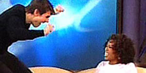 Tom Cruise jumps on the couch,declaring his love for Katie Holmes,on Oprah Winfrey’s show in 2005.