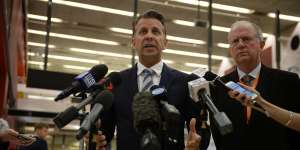 Transport Minister Andrew Constance,left,and Sydney Trains chief executive Howard Collins address the media on Wednesday.