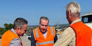 Jimmy Sullivan (centre) visiting a construction site in his electorate before he was expelled from the Labor Party.