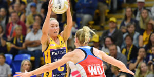 Lightning's Laura Langman (left) in action against the Swifts in last month's semi-final. 