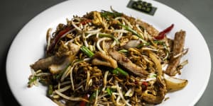 Stir-fried pork chop and instant noodles in XO sauce.