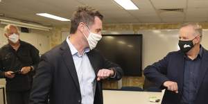 NSW Opposition Leader Chris Minns and federal Opposition Leader Anthony Albanese during a visit to the RFS Incident Control Centre in Moruya.
