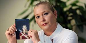 Virginia Giuffre with a photo of herself as a teen,when she says she was trafficked by Jeffrey Epstein. Giuffre died by suicide last year.