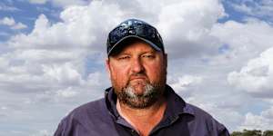 Nick Flanagan,next to the Mulwala Canal near his property outside of Finley.