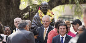 Mayor of Parramatta Andrew Wilson (far left,obscured) and Prime Minister Scott Morrison at the unveiling of a statue of Mahatma Ghandi at Jubilee Park in Parramatta in November 2018. Cr Barrak is in the foreground. 