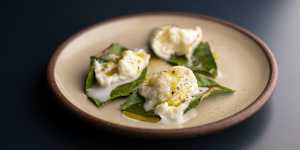 Mozzarella on lemon leaf.