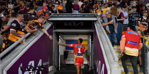 Hamiso Tabuai-Fidow walks down the tunnel after leaving the field for the Dolphins injured against the Brisbane Broncos.