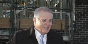 Prime Minister Scott Morrison visits a building site on Thursday. He announced a new scheme aiming to boost construction.