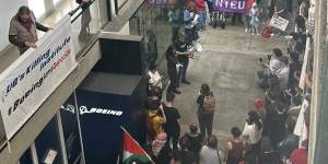 The accused told reporters he was arrested during a protest outside aerospace company Boeing’s headquarters in Brisbane.