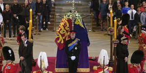 Prince William leads the vigil of the Queen’s grandchildren on Saturday in London.