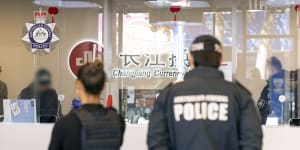 AFP officers raid a Changjiang branch in Sydney CBD.