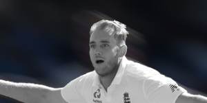 Stuart Broad celebrates snaring David Warner’s wicket.