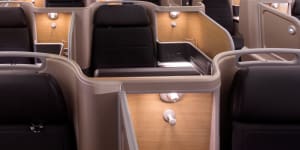 Business class has 28 suites in a 1-2-1 layout,giving each passenger direct aisle access.