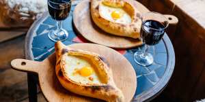 Khachapuri Adjarian style,with cheese and egg. 