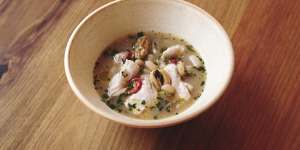 Fish in crazy water with mussels,herbs and semi-dried tomatoes.
