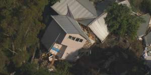 ‘Almighty sound’:House falls down cliff on Mornington Peninsula