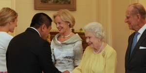 The Queen shakes hands with author and comedian,Anh Do,at a lunch at Government House in Canberra in 2011. The lunch was hosted by Quentin Bryce,left,who was governor-general at the time. Prince Philip is also pictured.