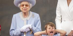 The Queen and Prince Louis on the balcony of Buckingham Palace