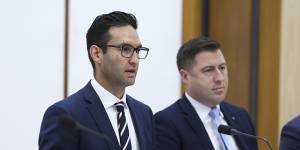 Chair Josh Burns and deputy chair Henry Pike during a hearing. 