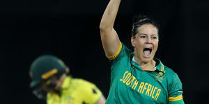 Marizanne Kapp celebrates taking the wicket of Alyssa Healy.