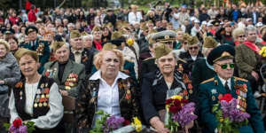 Acts of remembrance:Veterans attend a ceremony to commemorate victims of World War II on the Victory Day holiday on Friday in Donetsk,Ukraine.